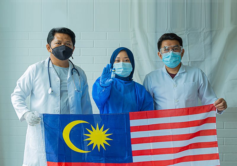 doctors with Malaysian flag